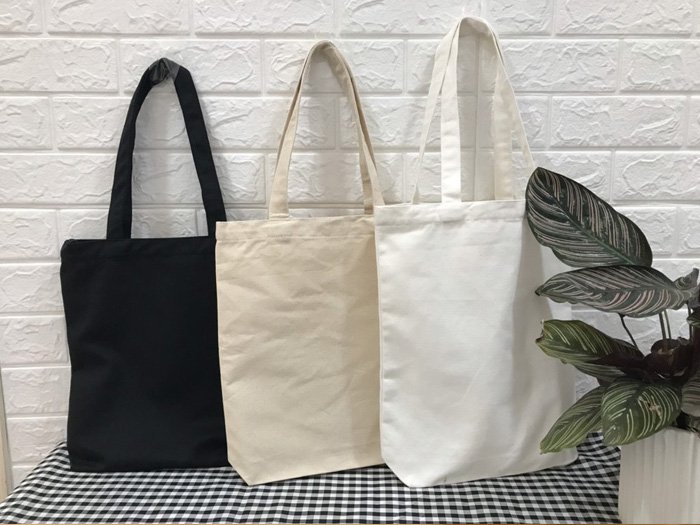 So sánh vải canvas mộc và canvas đã qua xử lý loại nào tốt hơn