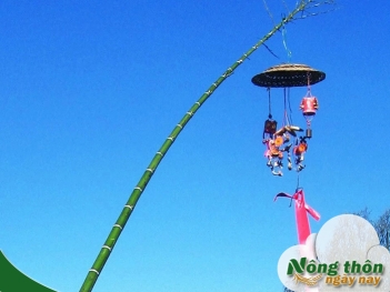 Tục dựng cây nêu ngày Tết và ý nghĩa xua đuổi tà khí - Nông Thôn ngày nay